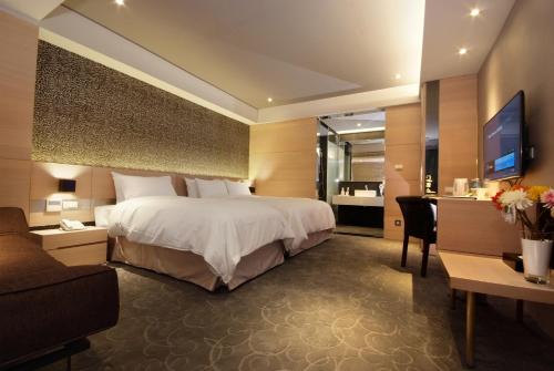 Guest Hotel tesisinde bir odada yatak veya yataklar
