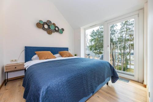 Ένα ή περισσότερα κρεβάτια σε δωμάτιο στο Sea & Sky Residence, City Centre