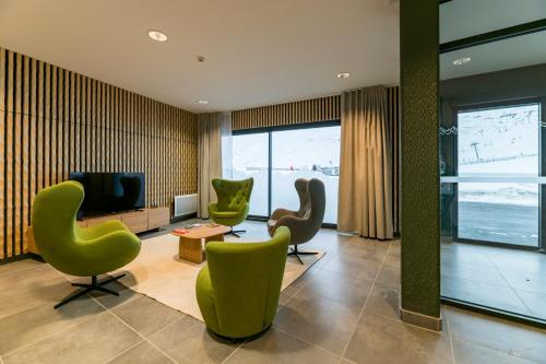 Χώρος καθιστικού στο Lagrange Vacances Le Cristal de Piau