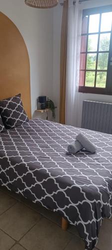 Ένα ή περισσότερα κρεβάτια σε δωμάτιο στο Appartement La Marmotte Compreignac