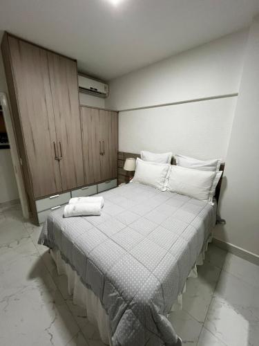 Katil atau katil-katil dalam bilik di Petunia Apartment