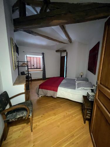 Postel nebo postele na pokoji v ubytování Le gîte du château
