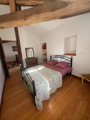 Postel nebo postele na pokoji v ubytování Le gîte du château