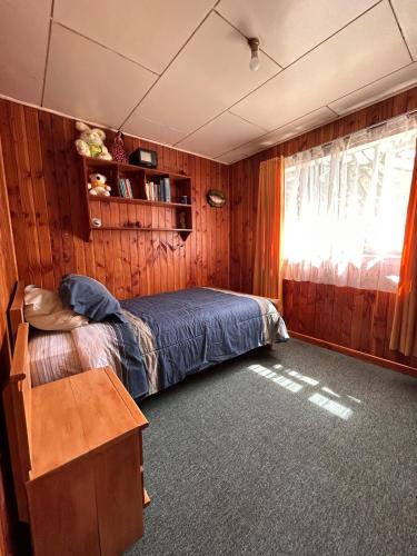 Postel nebo postele na pokoji v ubytování Pudú house