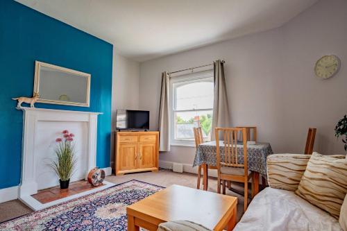 a living room with a couch and a table at Host & Stay - Cannon Apartment in Worcester