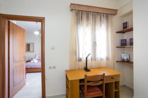 Ένα ή περισσότερα κρεβάτια σε δωμάτιο στο Perivolia suburb apts