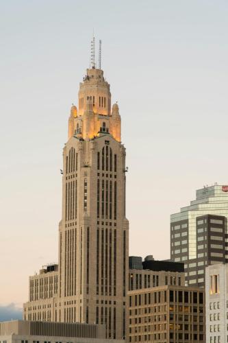 a tall building with a tower on top of it at Hotel LeVeque, Autograph Collection in Columbus