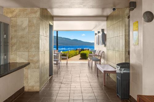 a hallway with a view of the ocean from a house at Maalaea Kai 311 in Wailuku