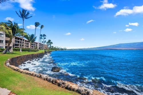 a view of the ocean from the shore of a resort at Maalaea Kai 311 in Wailuku