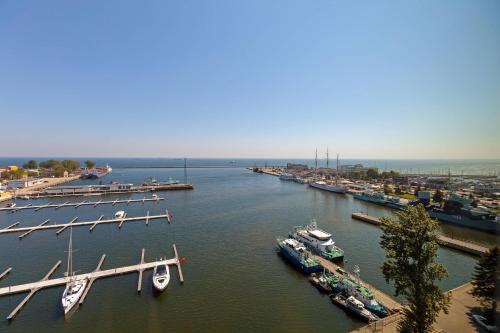 an aerial view of a marina with boats in the water at Courtyard by Marriott Gdynia Waterfront in Gdynia