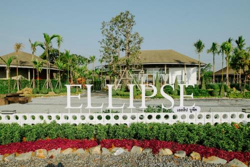 a sign that reads lupus in front of a building at Ellipse Boutique Phayao in Phayao