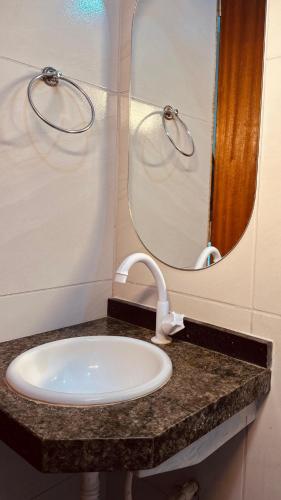 Ένα μπάνιο στο Pousada Villa Manzuá
