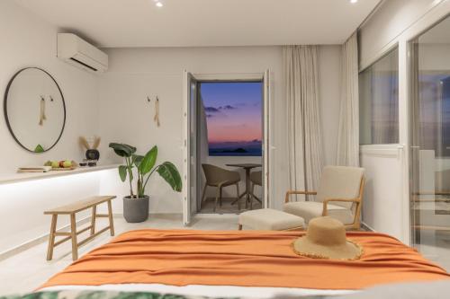 A bed or beds in a room at Seanfinity Beachfront Suites