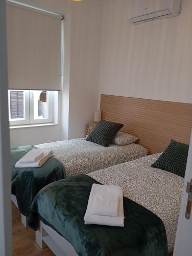 Giường trong phòng chung tại Sol e Rio