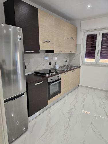 Kuchyň nebo kuchyňský kout v ubytování Exclusive Apartment