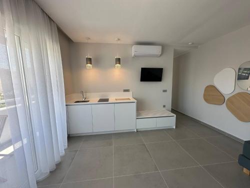 Η κουζίνα ή μικρή κουζίνα στο Executive Two Bedroom Suite