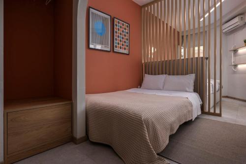 a small bedroom with a bed in a room at City Vibe Center Family Flat 3 in Thessaloniki
