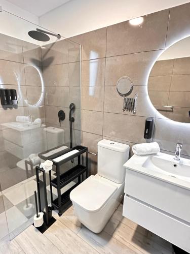 Ένα μπάνιο στο The Vibe Madeira Apartment 2