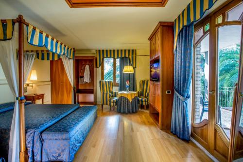 Postel nebo postele na pokoji v ubytování Hotel Casale