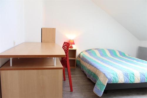 Ένα ή περισσότερα κρεβάτια σε δωμάτιο στο Appt Studio mezza LA ROCHELLE - LR030-A213