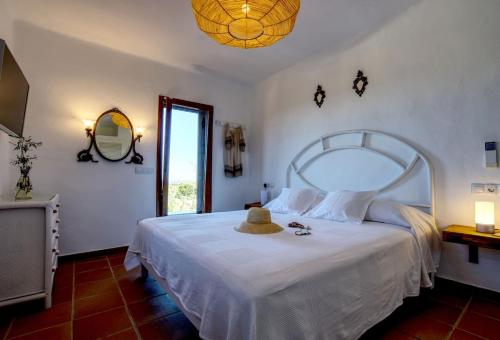 Ένα ή περισσότερα κρεβάτια σε δωμάτιο στο Villa Barbarosa