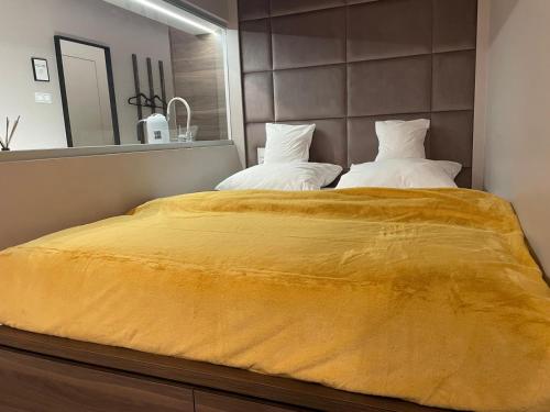 Postel nebo postele na pokoji v ubytování Apartament Central Station PARKING faktVat