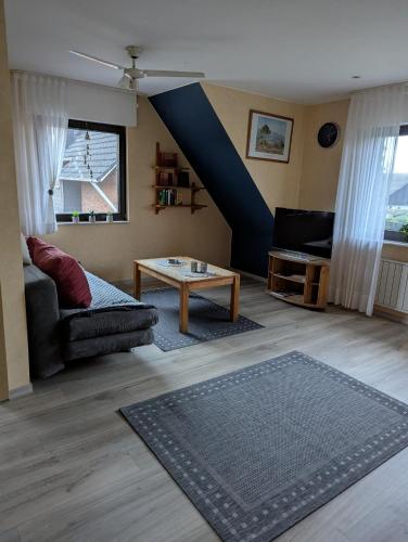 Posezení v ubytování Ferienwohnung Waldrand am See