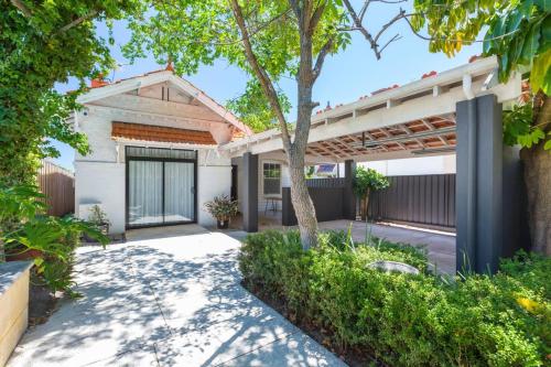 an image of a home with a walkway at Fusion of 20th century charm and modern convenience in Perth