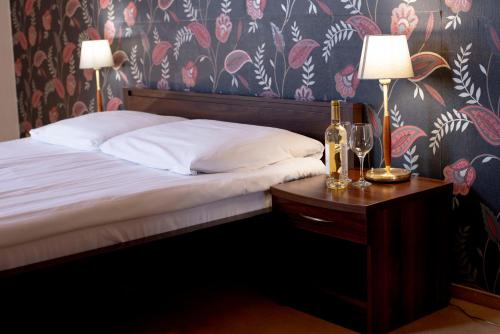 Katil atau katil-katil dalam bilik di Hotel Chrobry