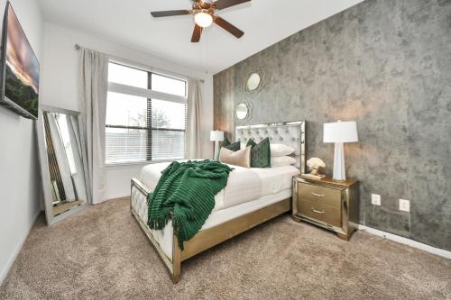 a bedroom with a large bed and a window at The Alexan* Walk to NRG* TX Med Center* Downtown in Houston