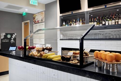 a counter with a bunch of different types of food at Courtyard Boston Downtown/North Station in Boston