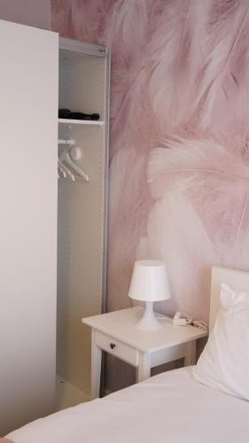 Ένα ή περισσότερα κρεβάτια σε δωμάτιο στο Mandeville Guest House