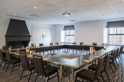 a large conference room with a long table and chairs at Courtyard by Marriott Boston Downtown in Boston