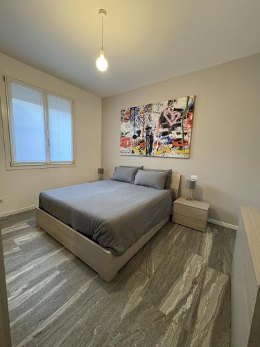 Una cama o camas en una habitación de Lux Flat Sesto
