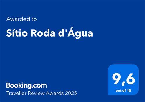 a blue sign with the wordsibo radio d ayula on it at Sítio Roda d'Água in Lagoa Santa
