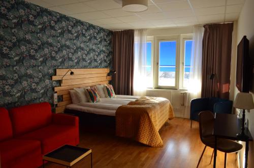 Postel nebo postele na pokoji v ubytování Hotel Falun