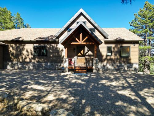 a house with a large driveway in front of it at Elk Haven in Alton