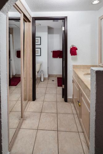 a bathroom with a sink and a toilet in it at 301 C Princesa de peñasco in Puerto Peñasco
