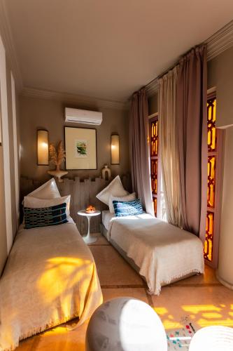 Llit o llits en una habitació de Riad 117
