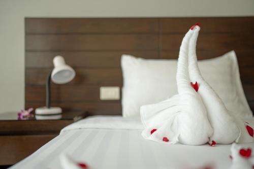 Ένα ή περισσότερα κρεβάτια σε δωμάτιο στο Yenna Apartment