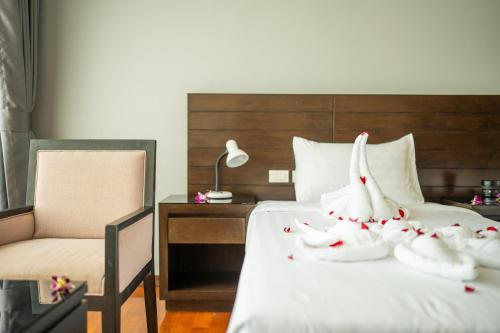 Ένα ή περισσότερα κρεβάτια σε δωμάτιο στο Yenna Apartment