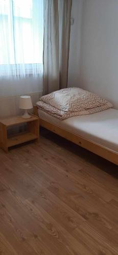 Postel nebo postele na pokoji v ubytování Pensjonat Motylewo
