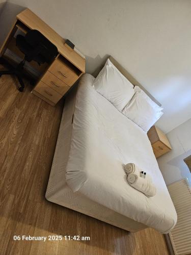 Ένα ή περισσότερα κρεβάτια σε δωμάτιο στο Norwich Home