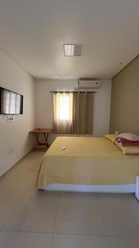 En eller flere senge i et værelse på Casa Barra Nova 082