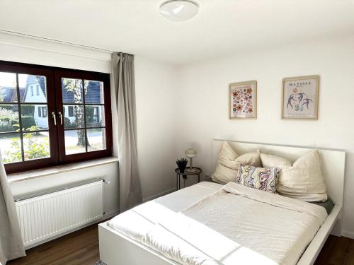 Ένα ή περισσότερα κρεβάτια σε δωμάτιο στο Spacious & Bright Family Escape