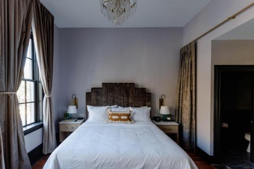 Una cama o camas en una habitación de Hotel Trundle