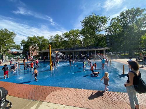 a group of people playing in a water park at Group Getaway of West New York in West New York