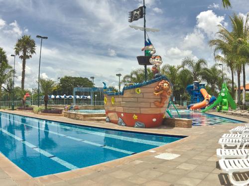 a pool at a resort with a water park at Bourbon Resort Atibaia in Atibaia