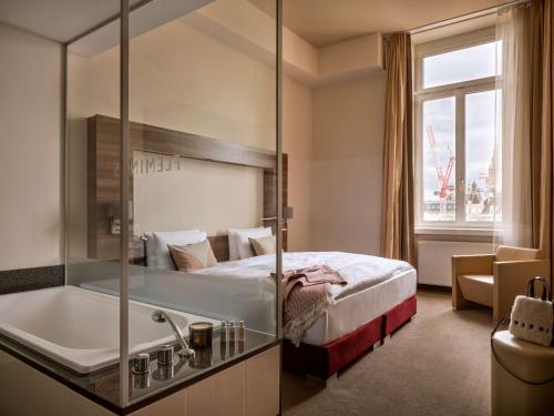 Postel nebo postele na pokoji v ubytování Flemings Selection Hotel Wien-City