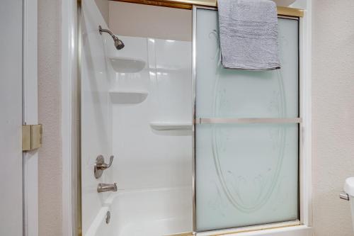 a shower with a glass door in a bathroom at 2 Mi to Beaches Condo with Patio in Port Hueneme! in Port Hueneme